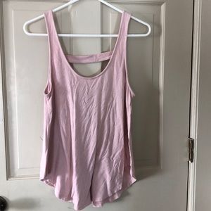Pink loose fitting tank top with low cut back